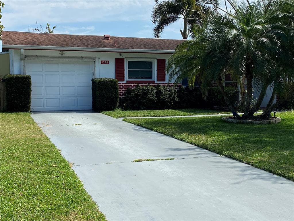 1229 LAZY LAKE ROAD W DUNEDIN, FL 34698