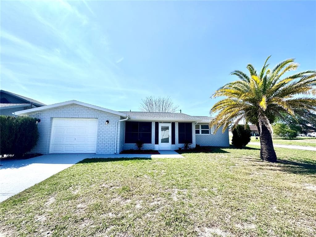 3355 WOODCOCK DRIVE HOLIDAY, FL 34690