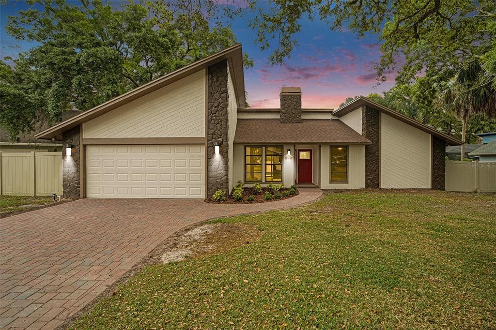 1051 SYLVIA LANE TAMPA, FL 33613