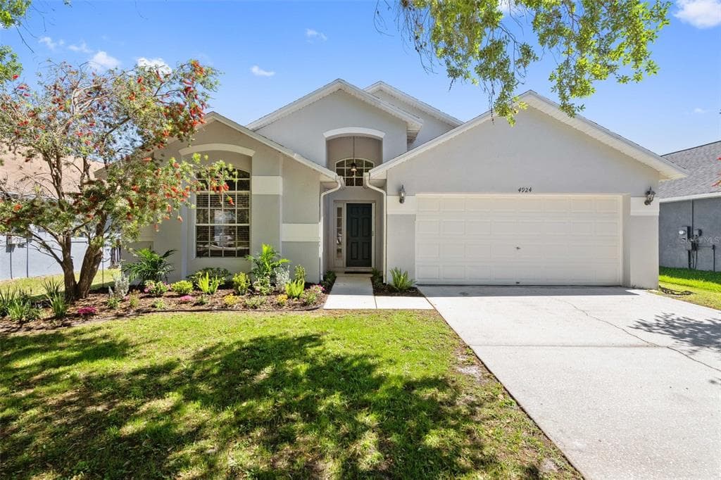 4924 HIDDEN HILLS LANE WESLEY CHAPEL, FL 33545