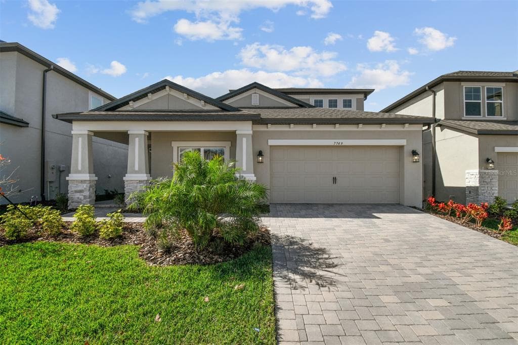 7749 BRONZE OAK DRIVE WESLEY CHAPEL, FL 33545
