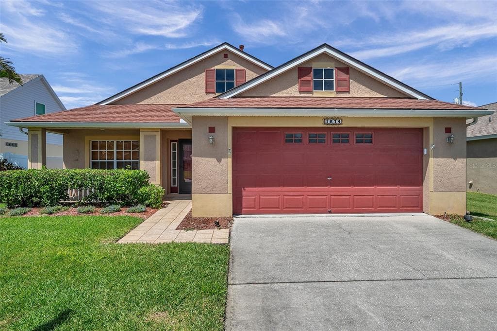 1674 MEADOW OAK LANE TARPON SPRINGS, FL 34689