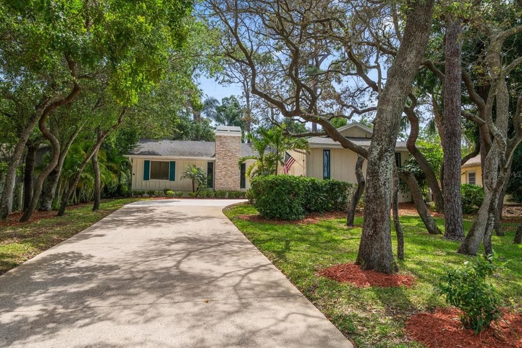 1428 RED OAK DRIVE TARPON SPRINGS, FL 34689