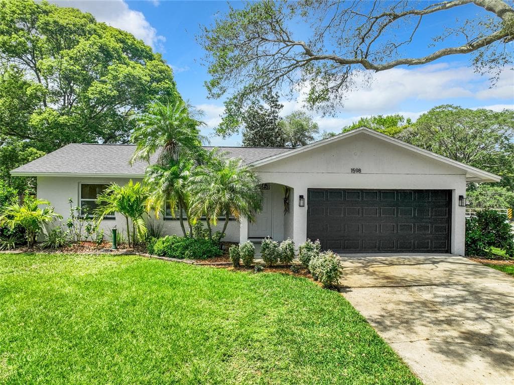 1598 SANDALWOOD DRIVE DUNEDIN, FL 34698