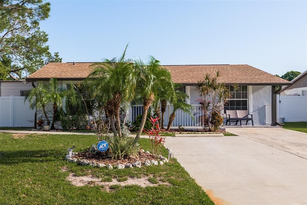 7911 WOODGROVE CIRCLE TAMPA, FL 33615