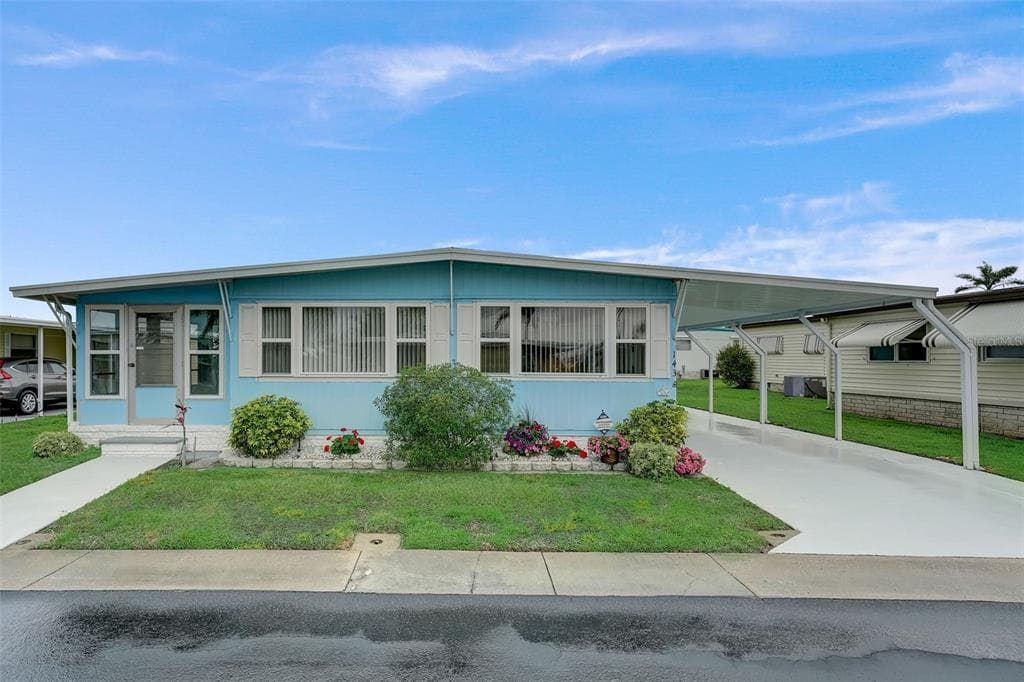 143 MELODY LANE TARPON SPRINGS, FL 34689