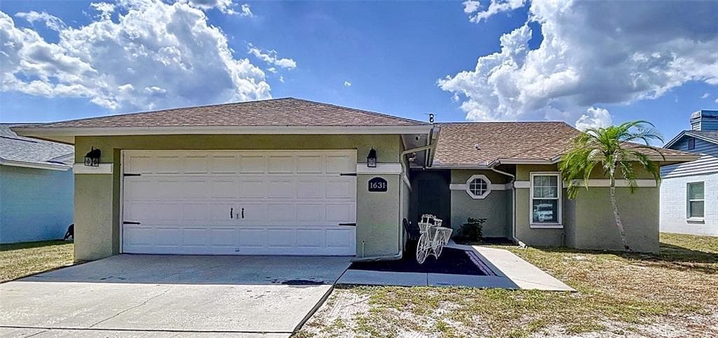 1631 COBBLER DRIVE LUTZ, FL 33559