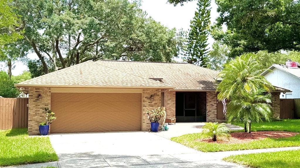 16607 E COURSE DRIVE TAMPA, FL 33624