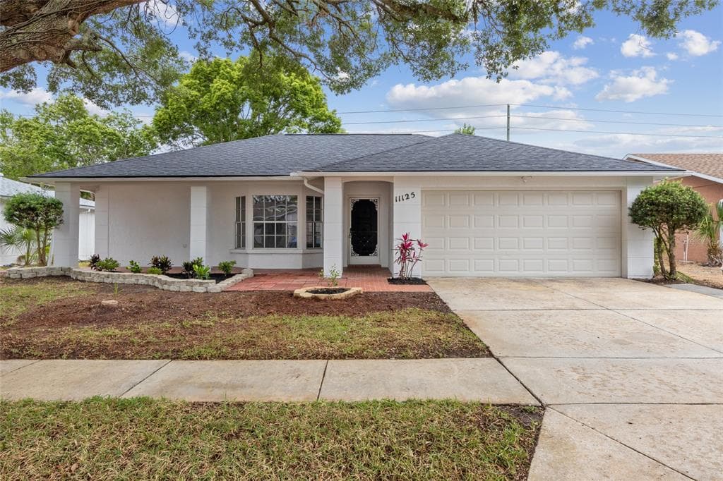 11125 ROLLINGWOOD DRIVE PORT RICHEY, FL 34668