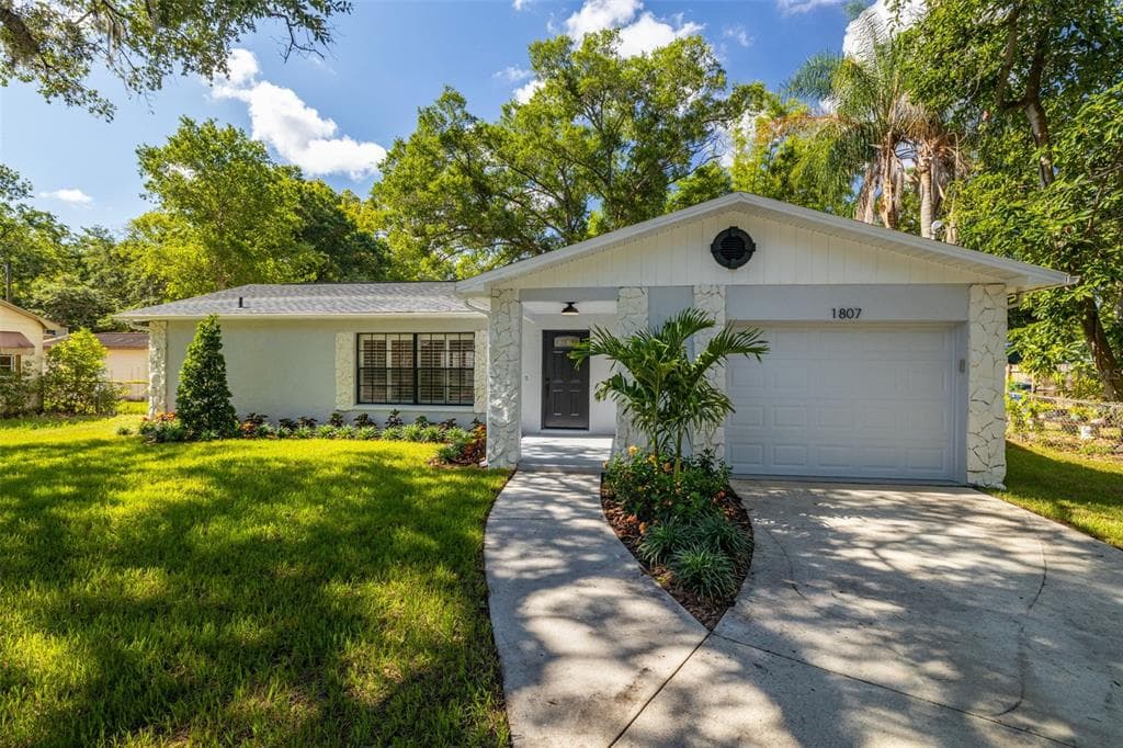 1807 E HENRY AVENUE TAMPA, FL 33610