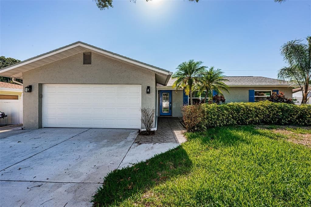 1099 DOGWOOD DRIVE DUNEDIN, FL 34698