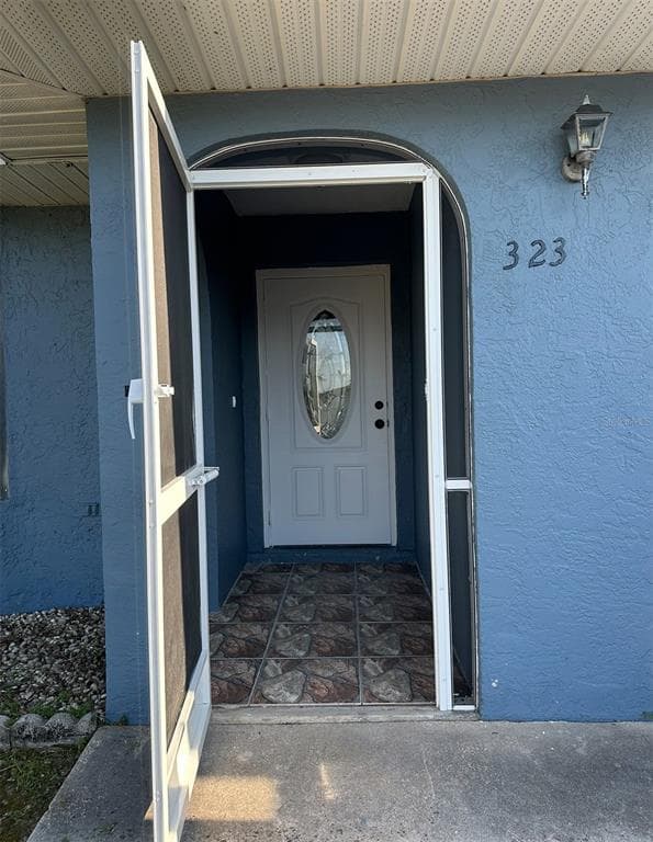 323 CENTER AVENUE NW PORT CHARLOTTE, FL 33952