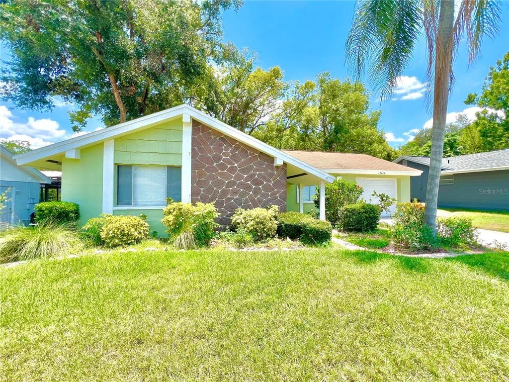 12206 QUAIL RUN ROW HUDSON, FL 34667