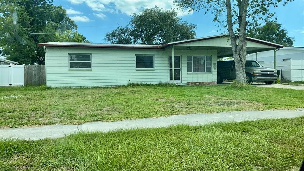 7706 W HENRY AVENUE TAMPA, FL 33615