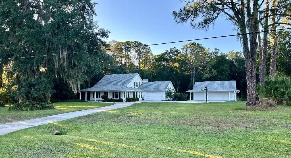 25121 OAKS BOULEVARD LAND O LAKES, FL 34639