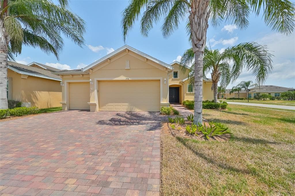 1736 PACIFIC DUNES DRIVE SUN CITY CENTER, FL 33573