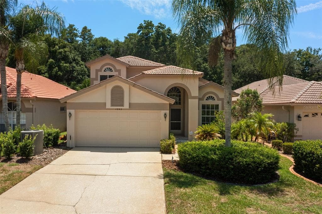 1242 LINDENWOOD DRIVE TARPON SPRINGS, FL 34688