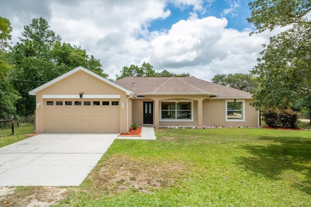 14306 ERMINE OWL ROAD WEEKI WACHEE, FL 34614