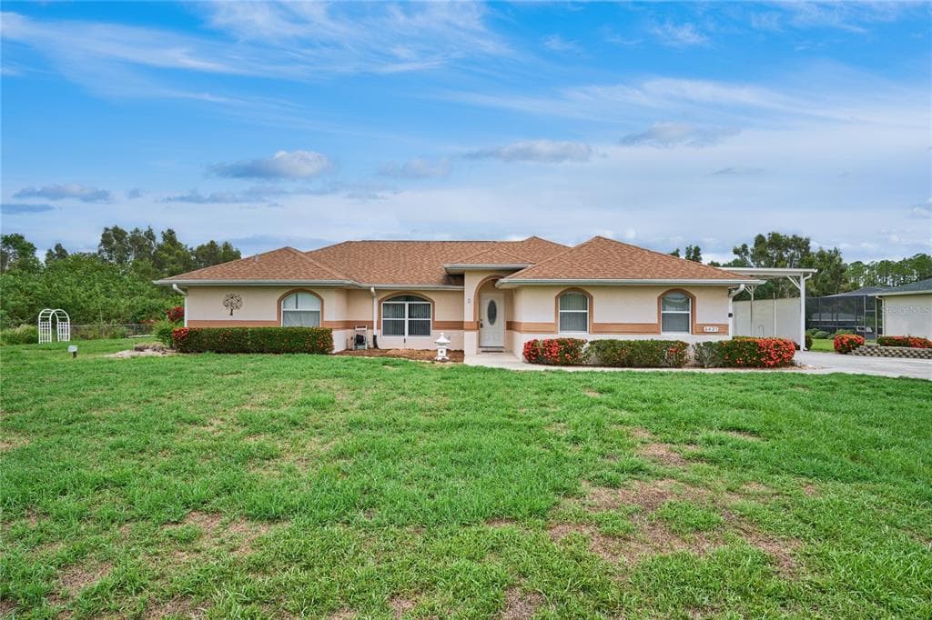 6421 AMARYLLIS DRIVE INDIAN LAKE ESTATES, FL 33855