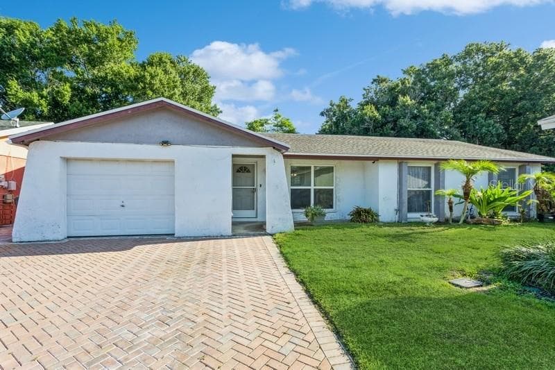 8909 HIGH RIDGE COURT TAMPA, FL 33634