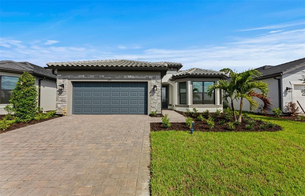 1871 PEPPER GRASS DRIVE NORTH PORT, FL 34289