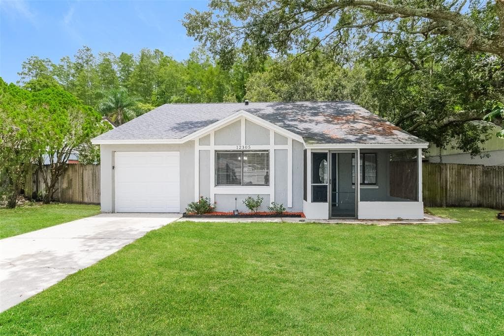 12305 HIDDEN BROOK DRIVE TAMPA, FL 33624