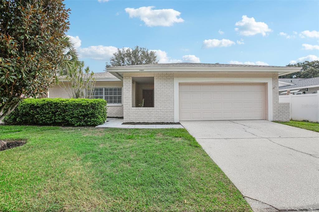 11607 PAINTED HILLS LANE TAMPA, FL 33624