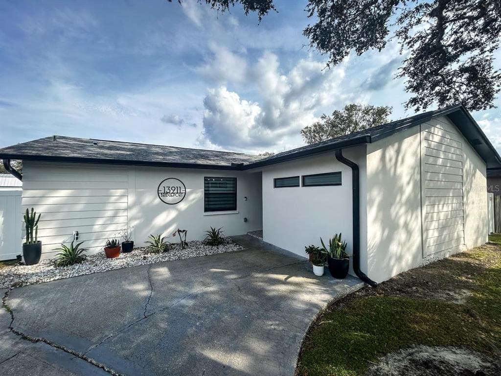 13911 BRIDGEPORT DRIVE TAMPA, FL 33625