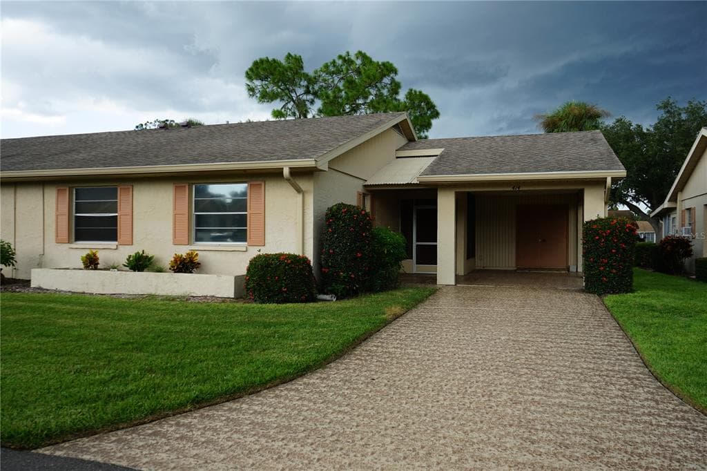 414 GLADSTONE PLACE UNIT 105 SUN CITY CENTER, FL 33573