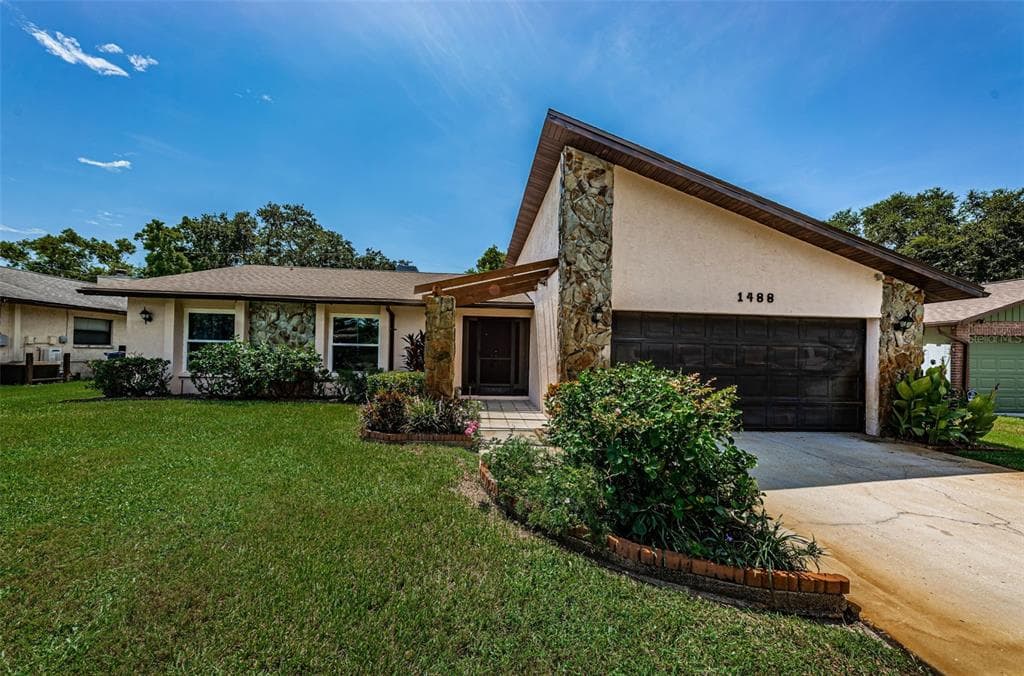 1488 PATRICIA AVENUE DUNEDIN, FL 34698