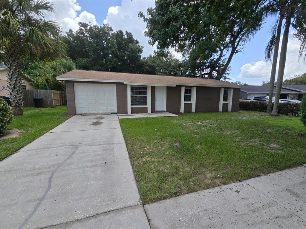909 SUTHERLAND CIRCLE VALRICO, FL 33594
