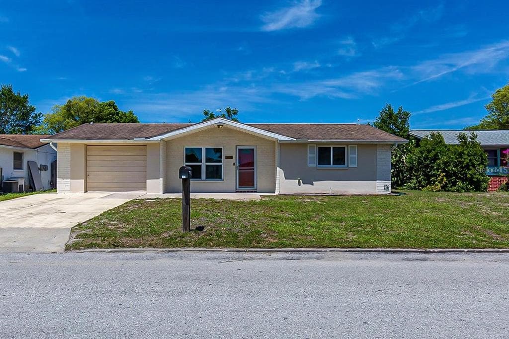 7735 FOXBLOOM DRIVE PORT RICHEY, FL 34668