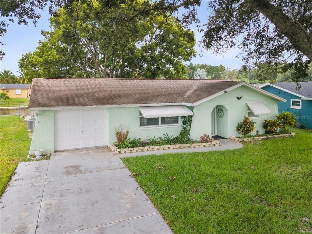 7311 CALDER DRIVE NEW PORT RICHEY, FL 34653