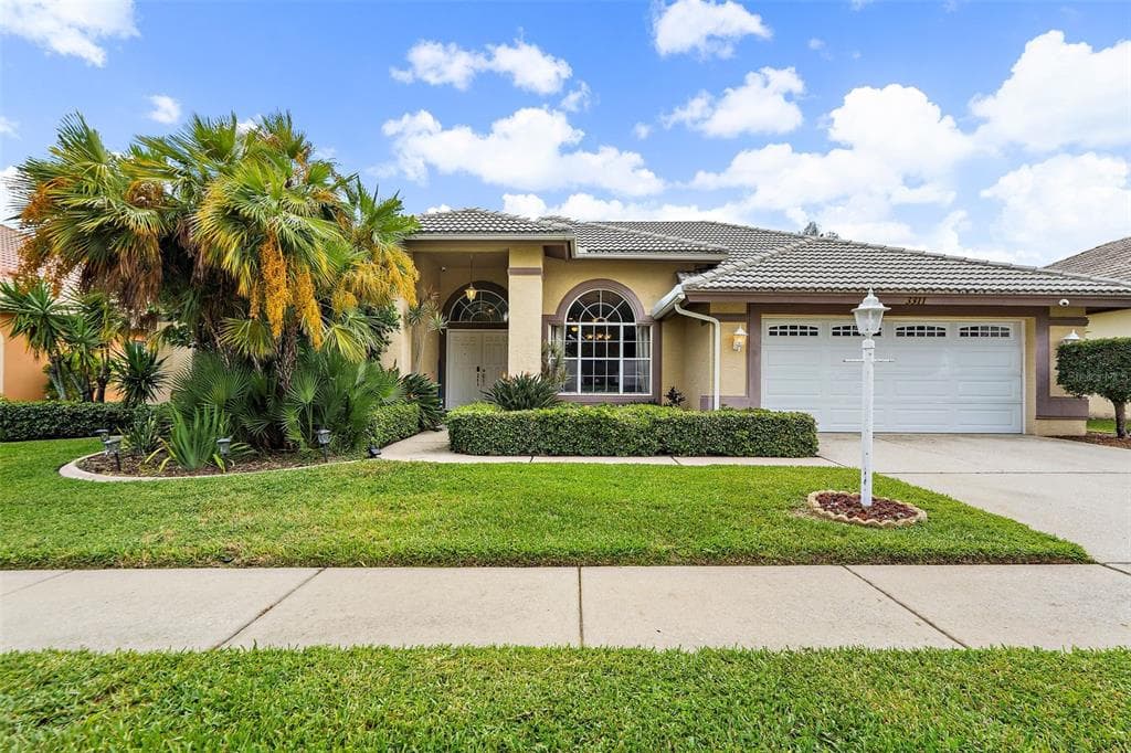 3311 HEARTHSTONE COURT HOLIDAY, FL 34691