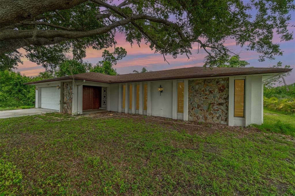 551 AZALEA AVENUE NW PORT CHARLOTTE, FL 33952