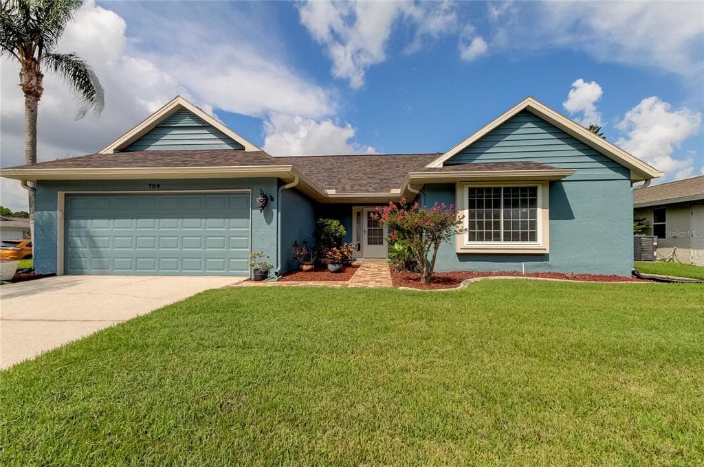 704 JACARANDA DRIVE OLDSMAR, FL 34677