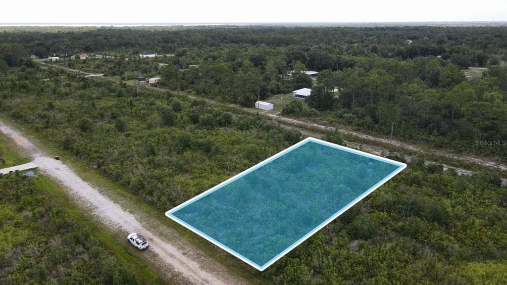 410 MAGNOLIA DRIVE INDIAN LAKE ESTATES, FL 33855