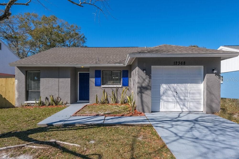 12368 WITHERIDGE DRIVE TAMPA, FL 33624
