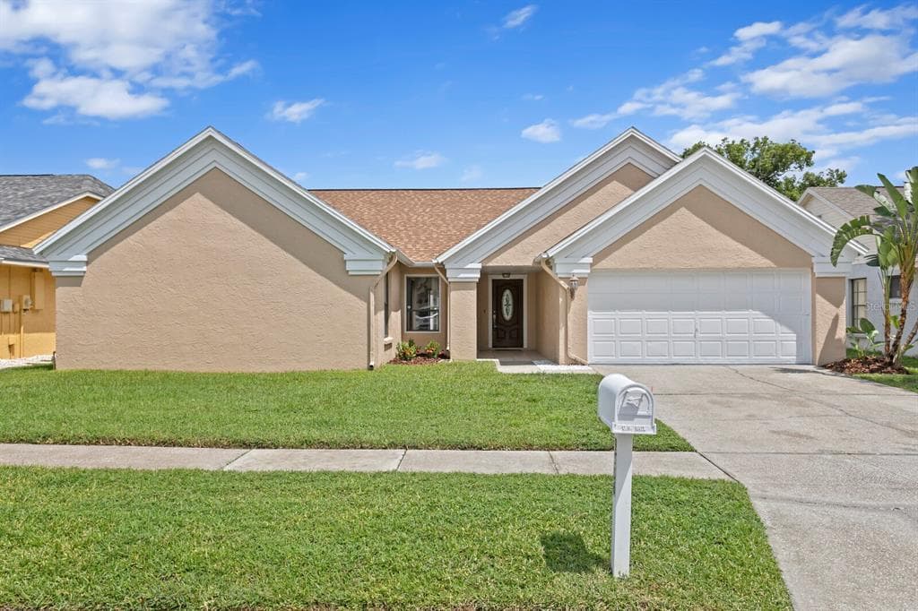 9506 PEBBLE GLEN AVENUE TAMPA, FL 33647