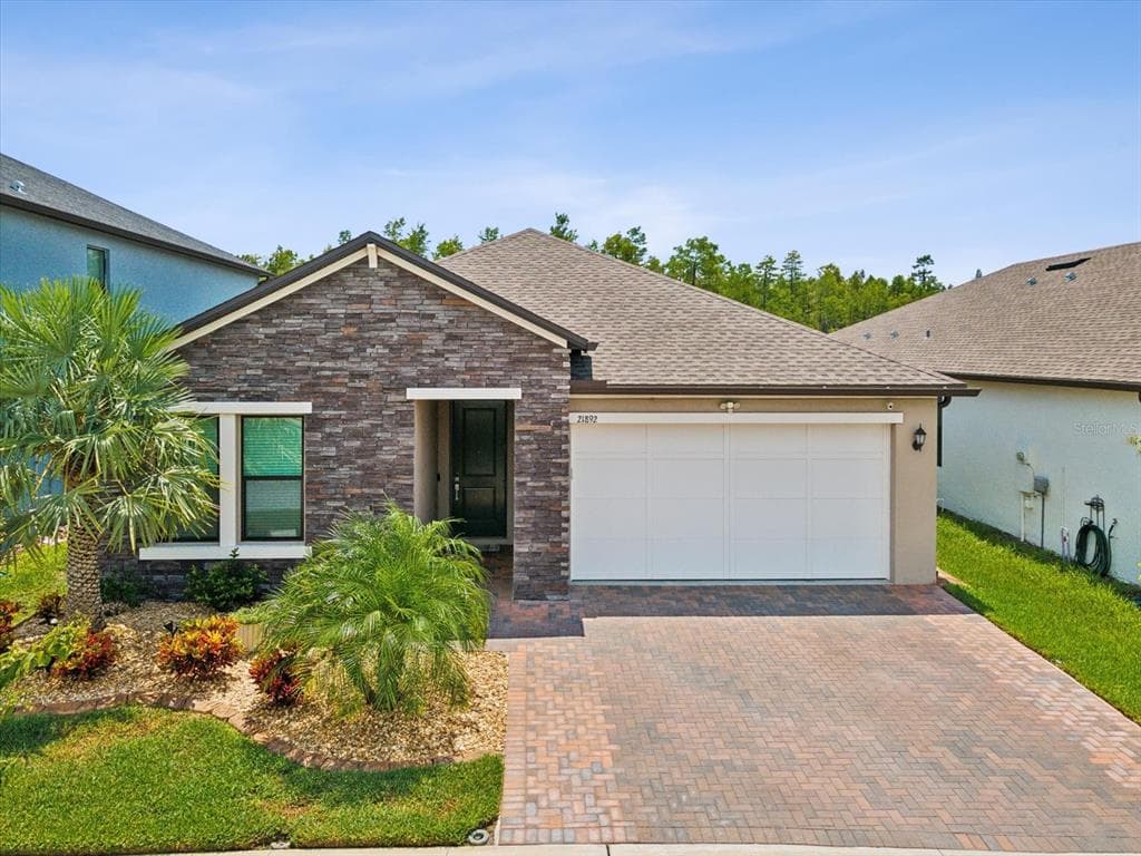 21892 VIOLET PERIWINKLE DRIVE LAND O LAKES, FL 34637