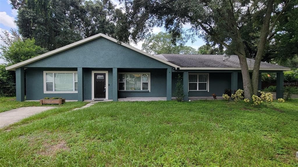 8013 N OLA AVENUE TAMPA, FL 33604