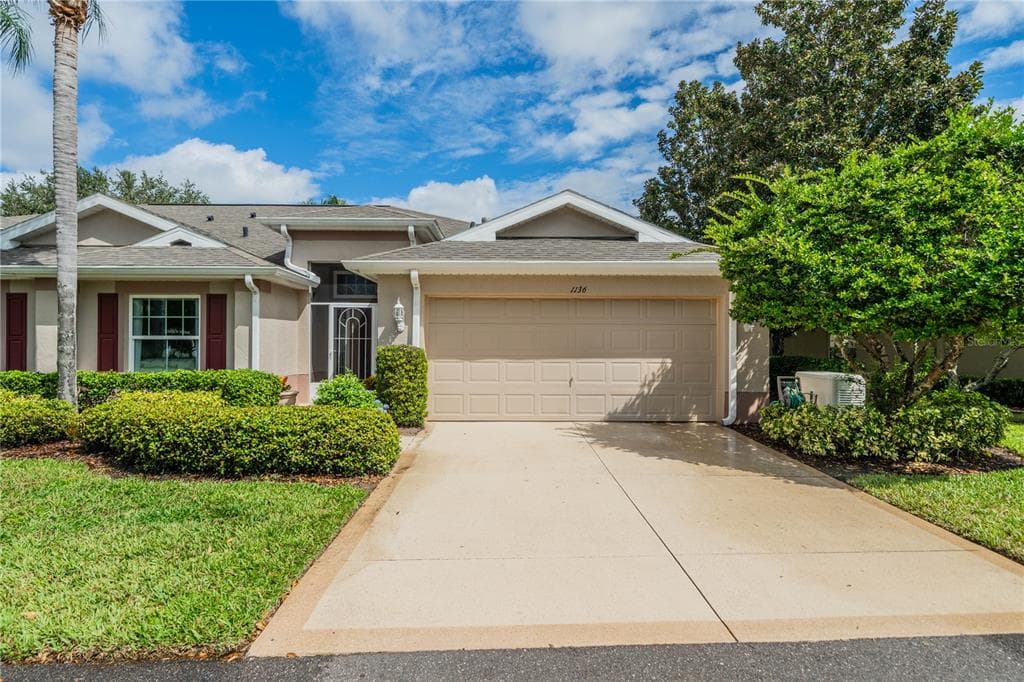 1136 CORINTH GREENS DRIVE SUN CITY CENTER, FL 33573