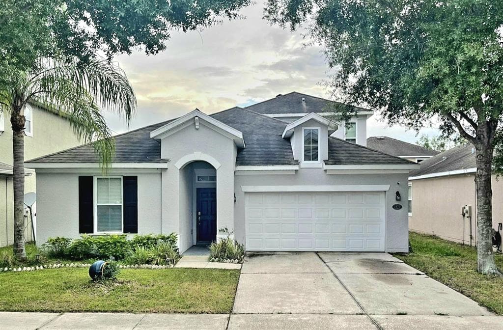 7937 CAMDEN WOODS DRIVE TAMPA, FL 33619
