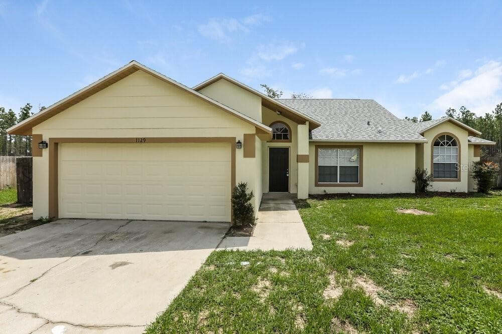 1129 MONTEAGLE CIRCLE APOPKA, FL 32712