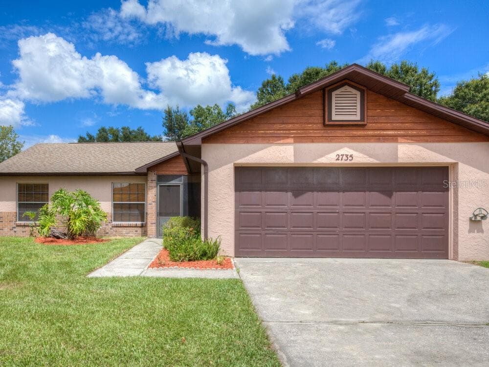 2735 TALLADEGA DRIVE ORLANDO, FL 32826