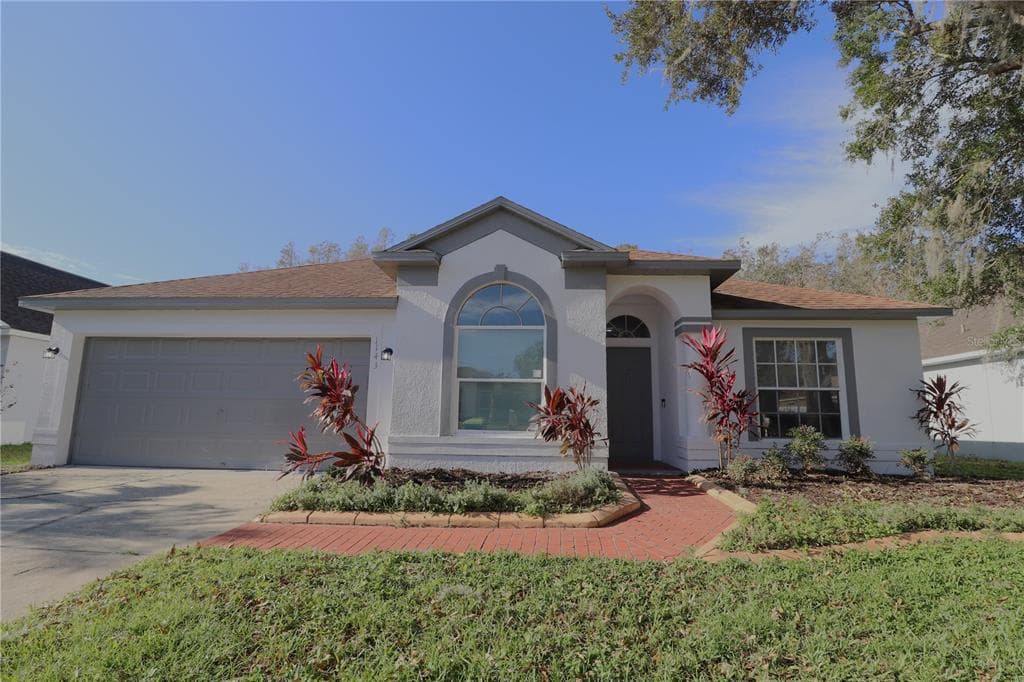 1143 TIMBER TRACE DRIVE WESLEY CHAPEL, FL 33543
