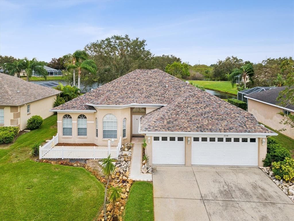 1054 SAWGRASS DRIVE TARPON SPRINGS, FL 34689