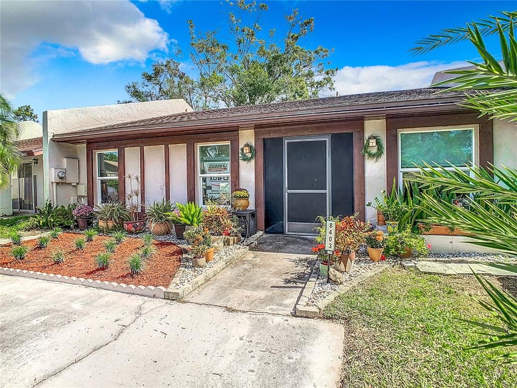 8403 WAKULLA DRIVE TEMPLE TERRACE, FL 33637