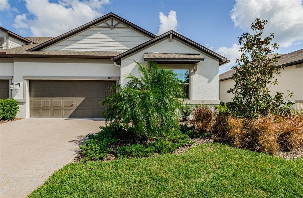 9912 CAMPANULA COURT LAND O LAKES, FL 34637
