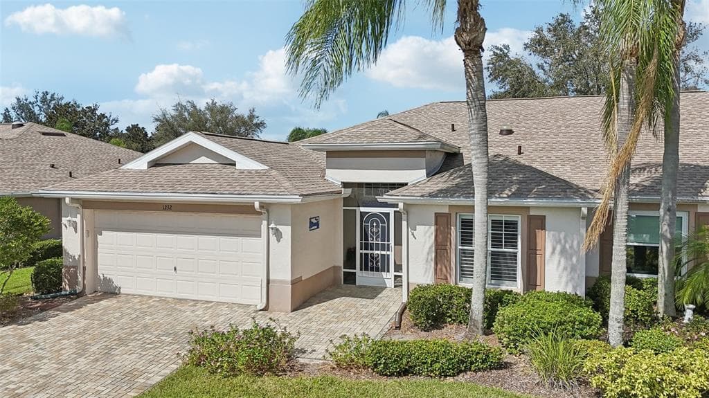 1232 CORINTH GREENS DRIVE SUN CITY CENTER, FL 33573